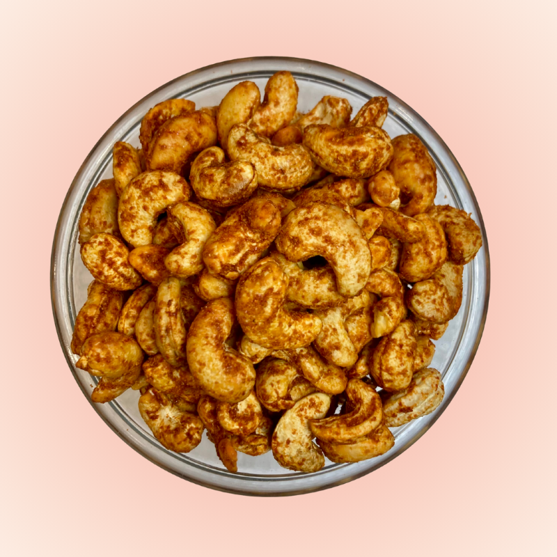 lear glass bowl filled with vibrant, Premium Thai Chilli Roasted Cashew Nuts