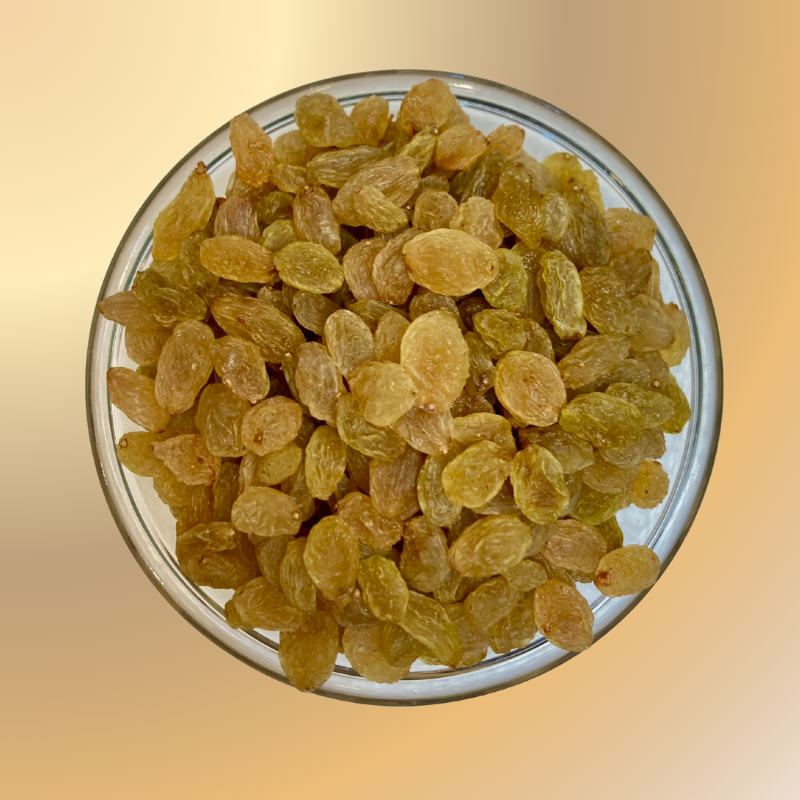 clear glass bowl of Premium Golden Raisins